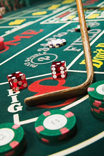 Mobile phone displaying dewi platform home screen with sports, casino, and slots sections